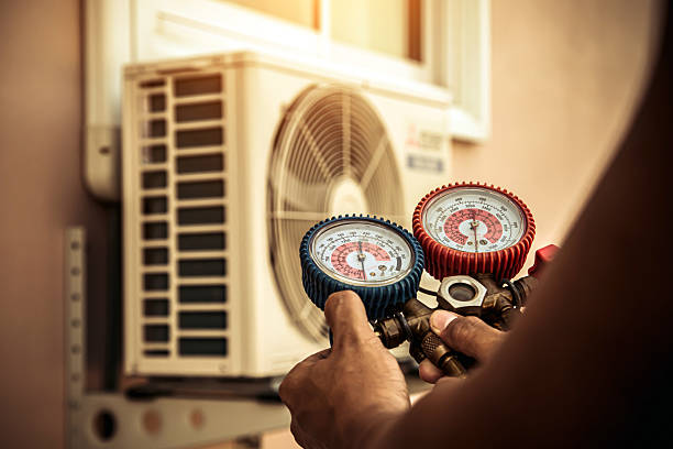 Professional Heat Pump Repair technician working in Goodman, MO